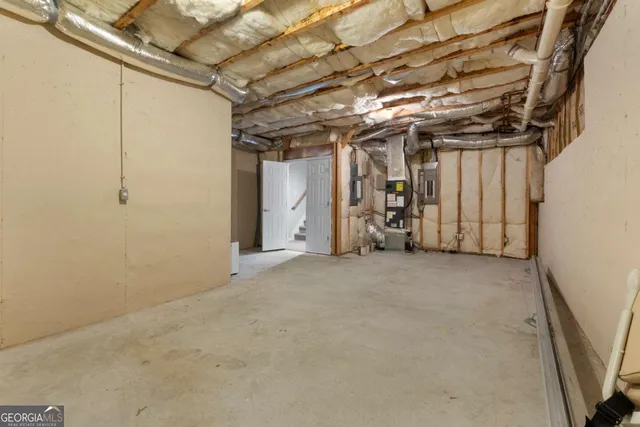 a bathroom with a toilet a sink and bathtub
