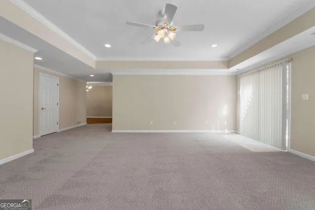 a balcony with table and chairs