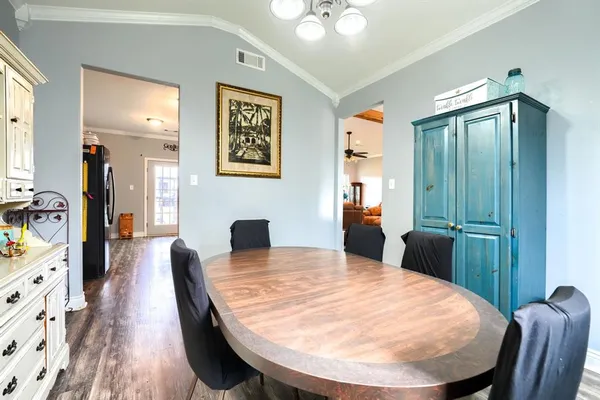 a view of a dining room with furniture