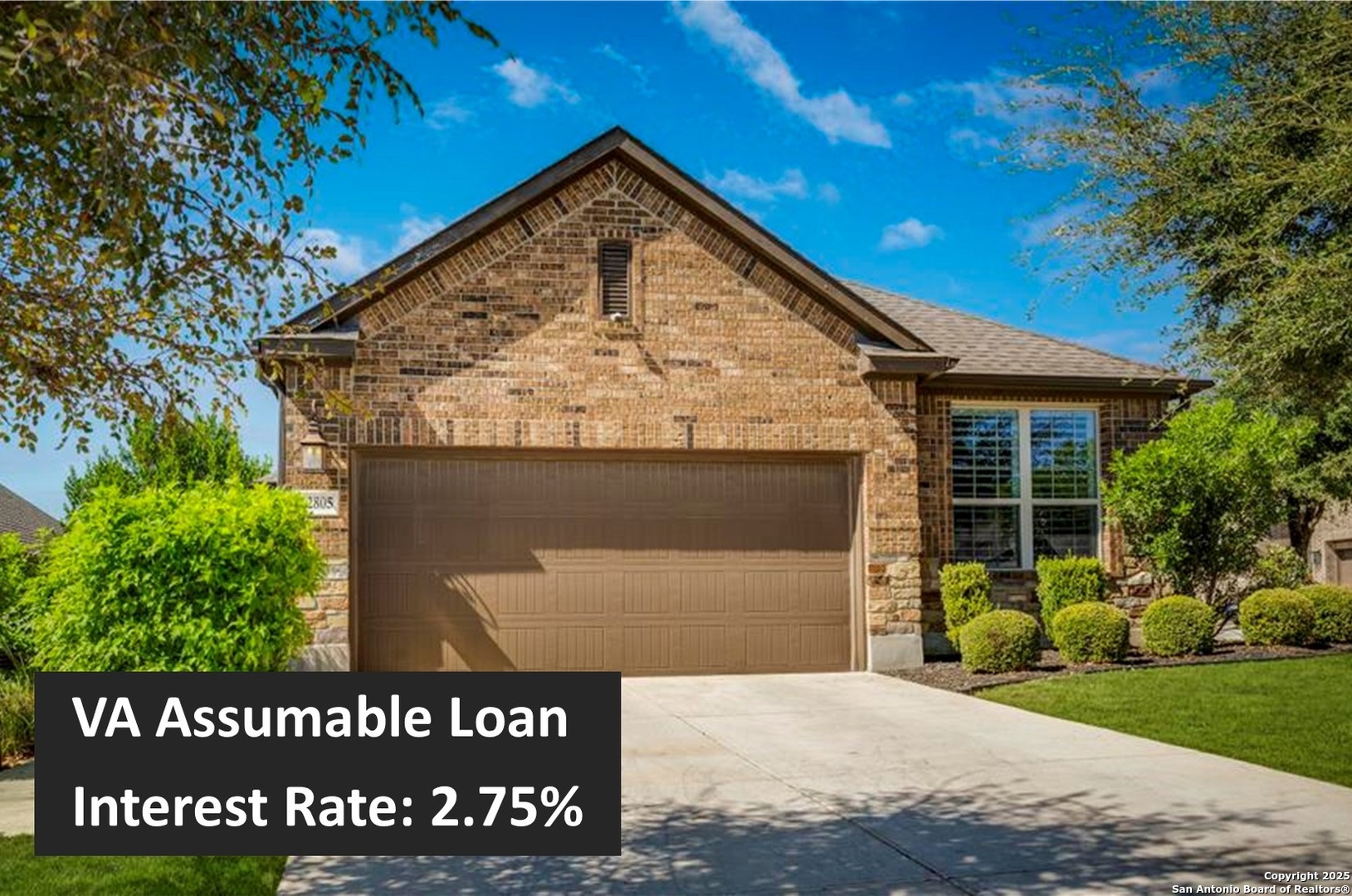 a view of a house with a small yard