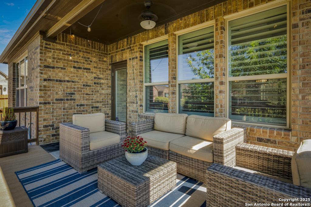 12805 Big Tank Ranch San Antonio, TX 78245 - Photo 27 of 35 a living room with furniture and a window