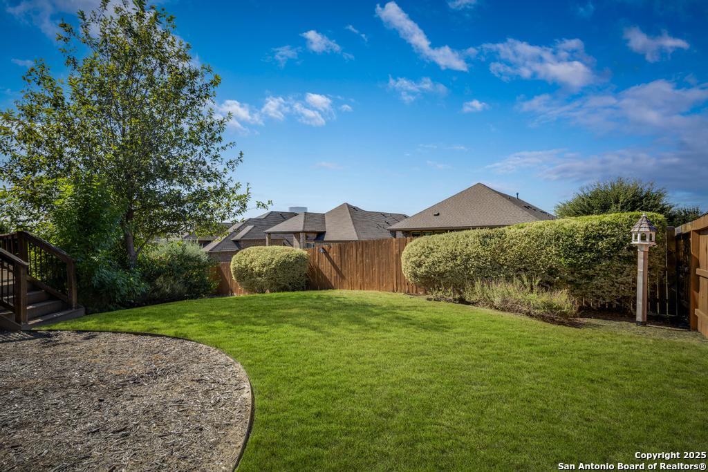 12805 Big Tank Ranch San Antonio, TX 78245 - Photo 29 of 35 a view of a house with a yard