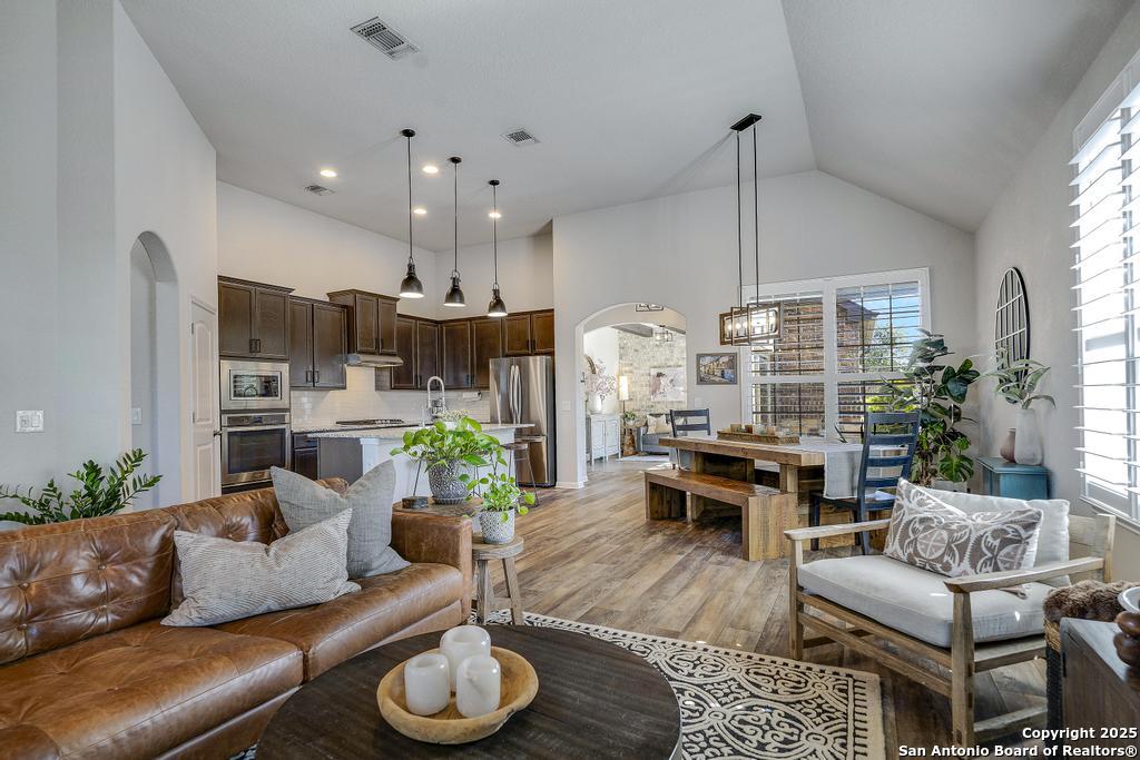 12805 Big Tank Ranch San Antonio, TX 78245 - Photo 7 of 35 a living room with furniture kitchen and a large window