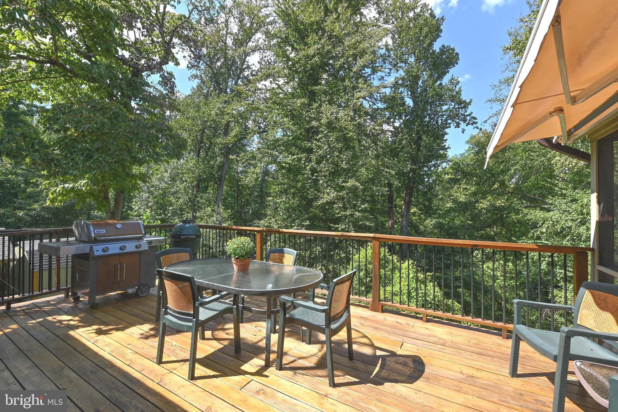 2520 Colonial Road Accokeek, MD 20607 - Photo 17 of 74 a balcony with wooden floor table and chairs