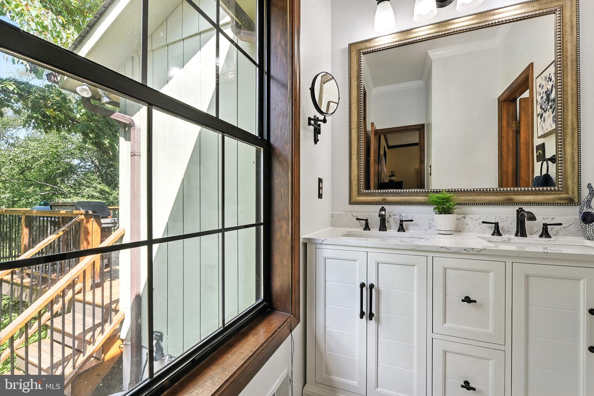 2520 Colonial Road Accokeek, MD 20607 - Photo 22 of 74 a bathroom with a double vanity sink mirror and