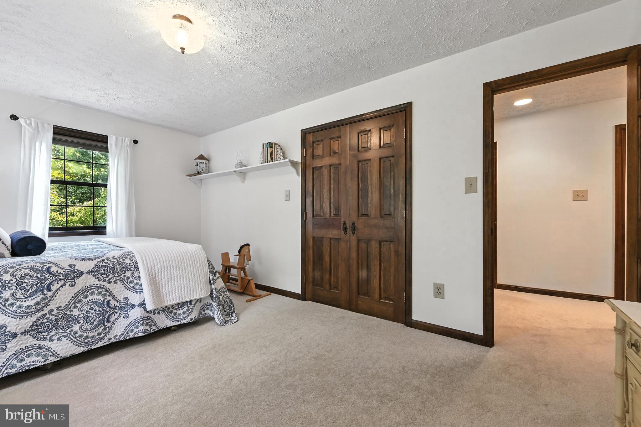 2520 Colonial Road Accokeek, MD 20607 - Photo 24 of 74 a bedroom with a bed and a window