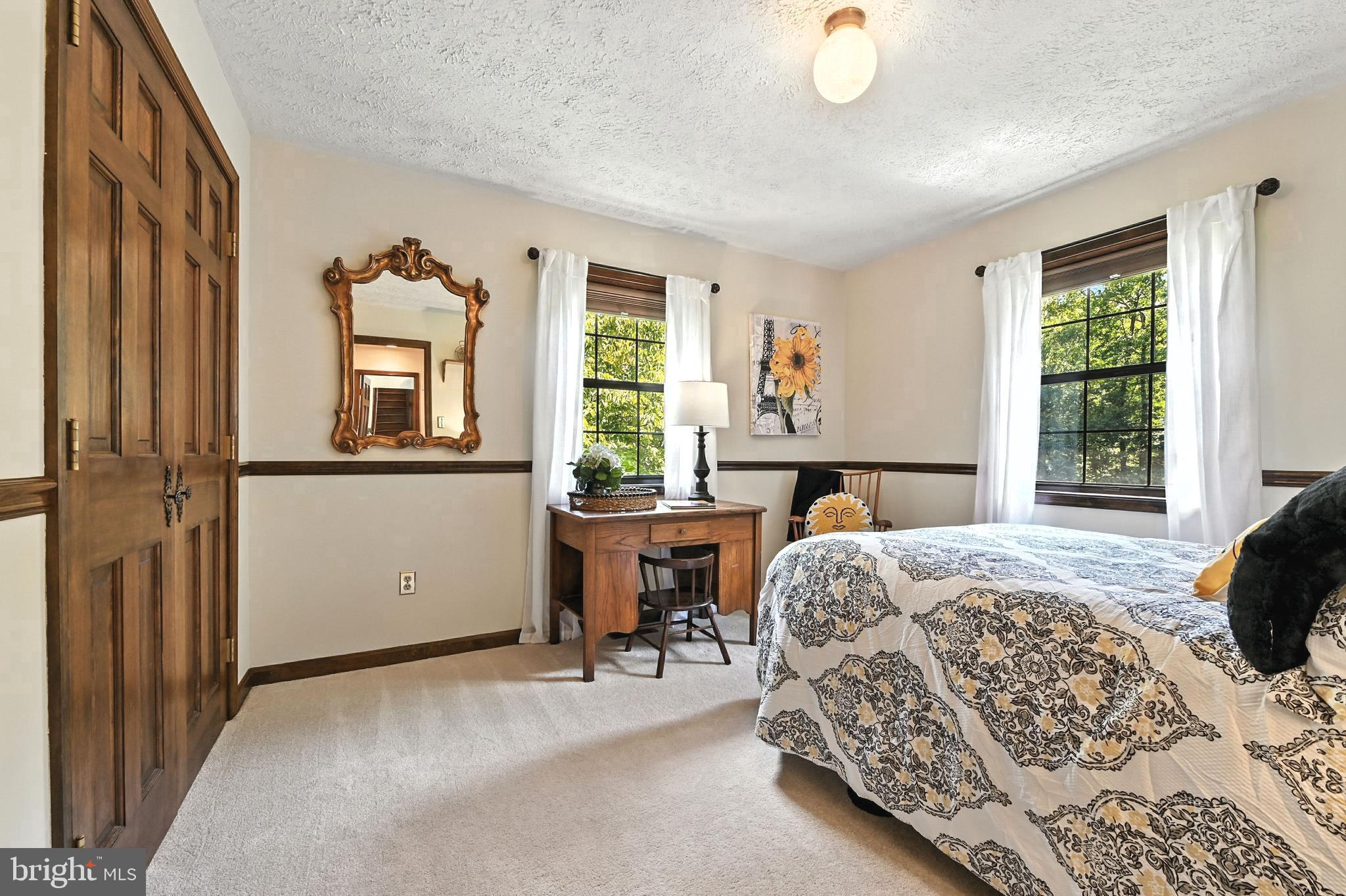 2520 Colonial Road Accokeek, MD 20607 - Photo 26 of 74 a bedroom with a bed and wooden floor