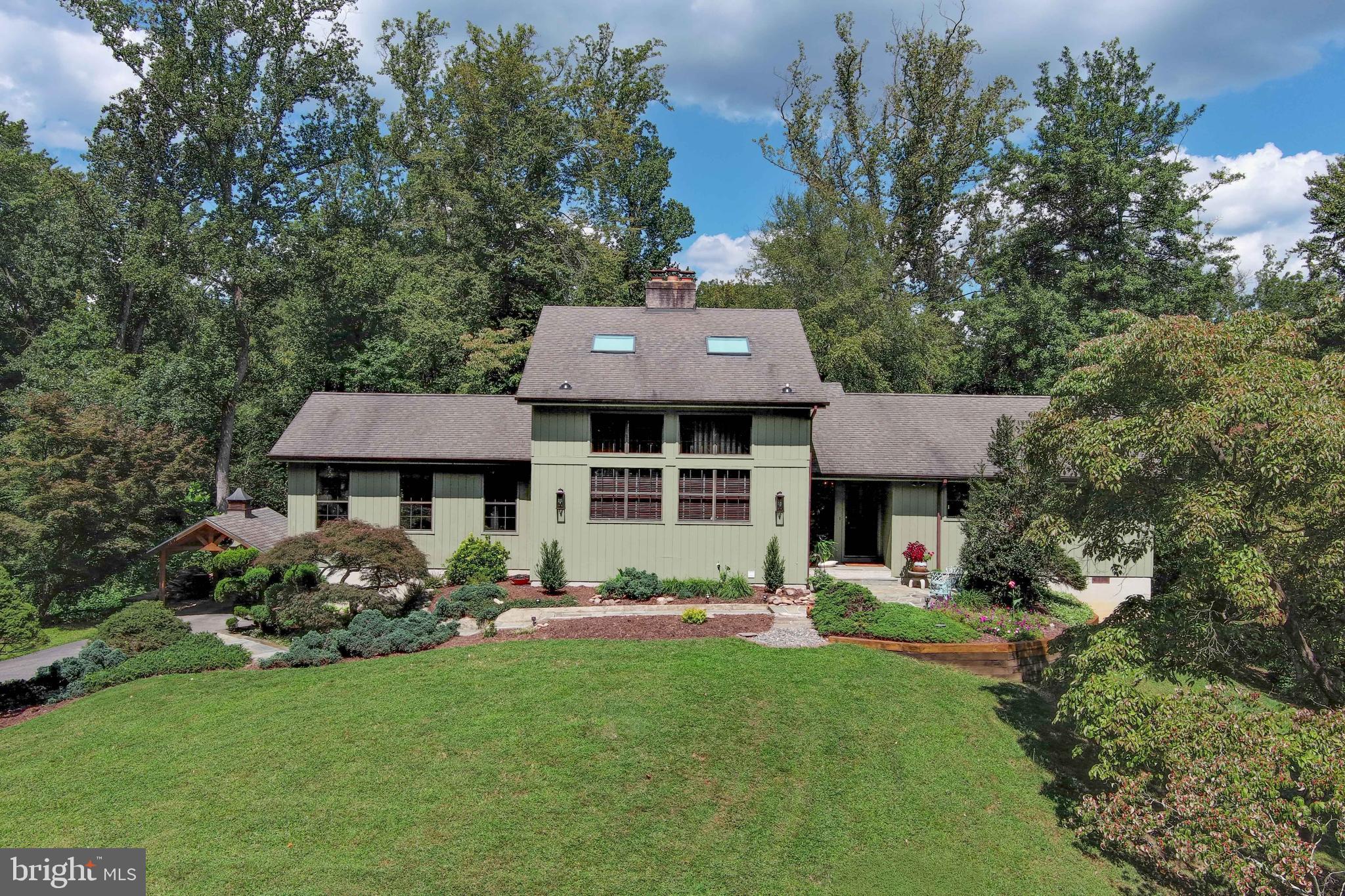 2520 Colonial Road Accokeek, MD 20607 - Photo 61 of 74 a front view of a house with garden
