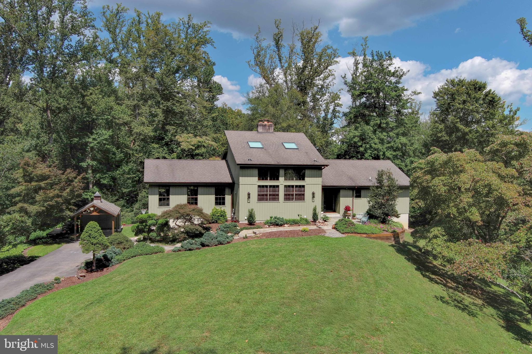 2520 Colonial Road Accokeek, MD 20607 - Photo 62 of 74 a front view of a house with garden