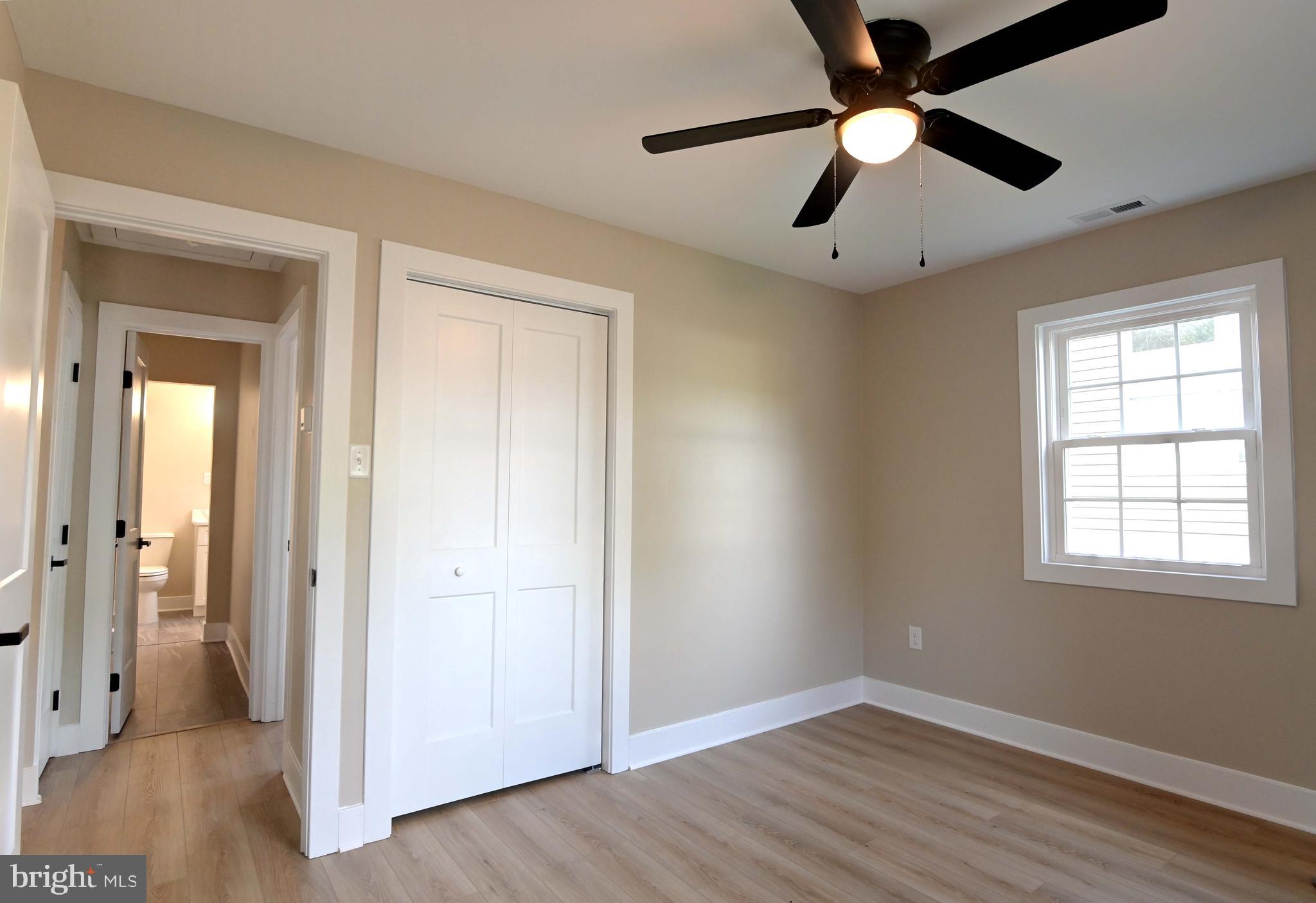 1616 Beech Road St. Leonard, MD 20685 - Photo 11 of 40 wooden floor in an empty room with a window