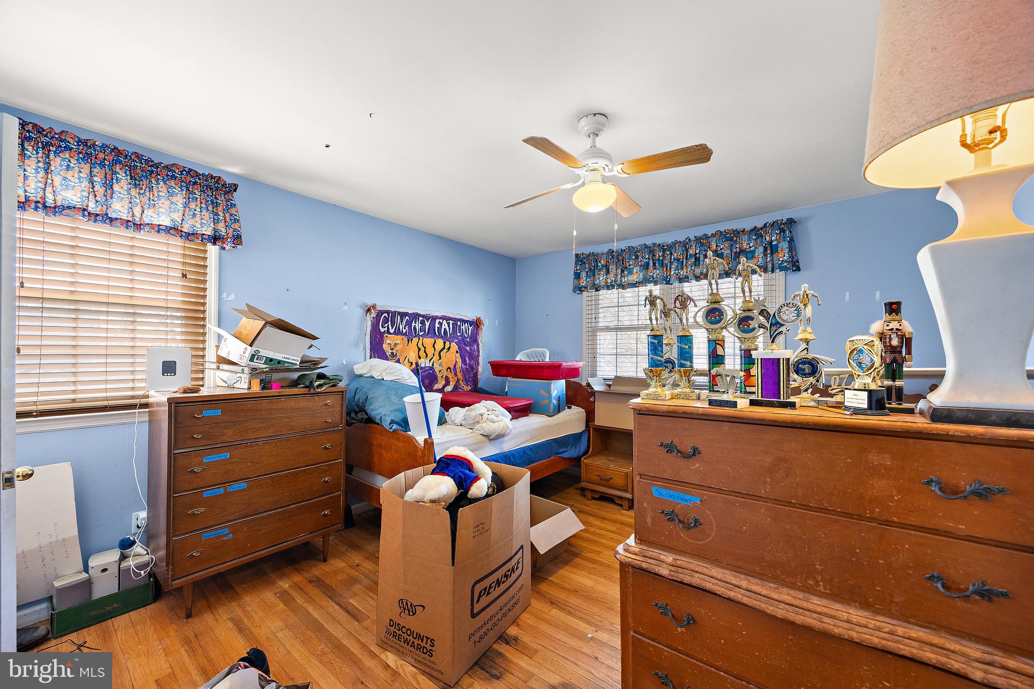 506 Cambridge Drive Newark, DE 19711 - Photo 18 of 38 a room with wooden furniture and a window
