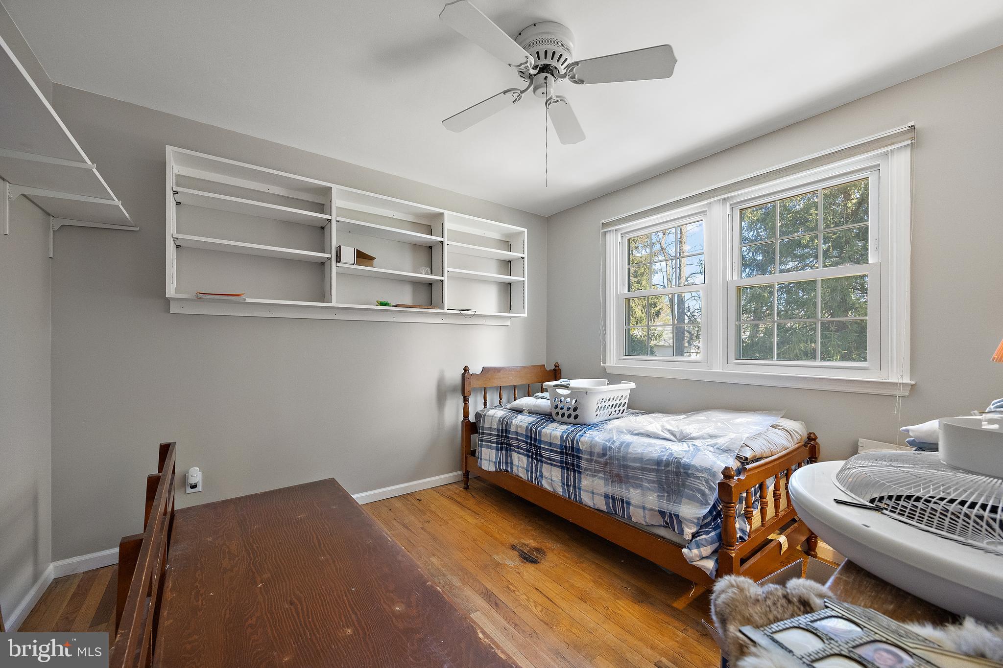 506 Cambridge Drive Newark, DE 19711 - Photo 25 of 38 a bedroom with a bed and windows