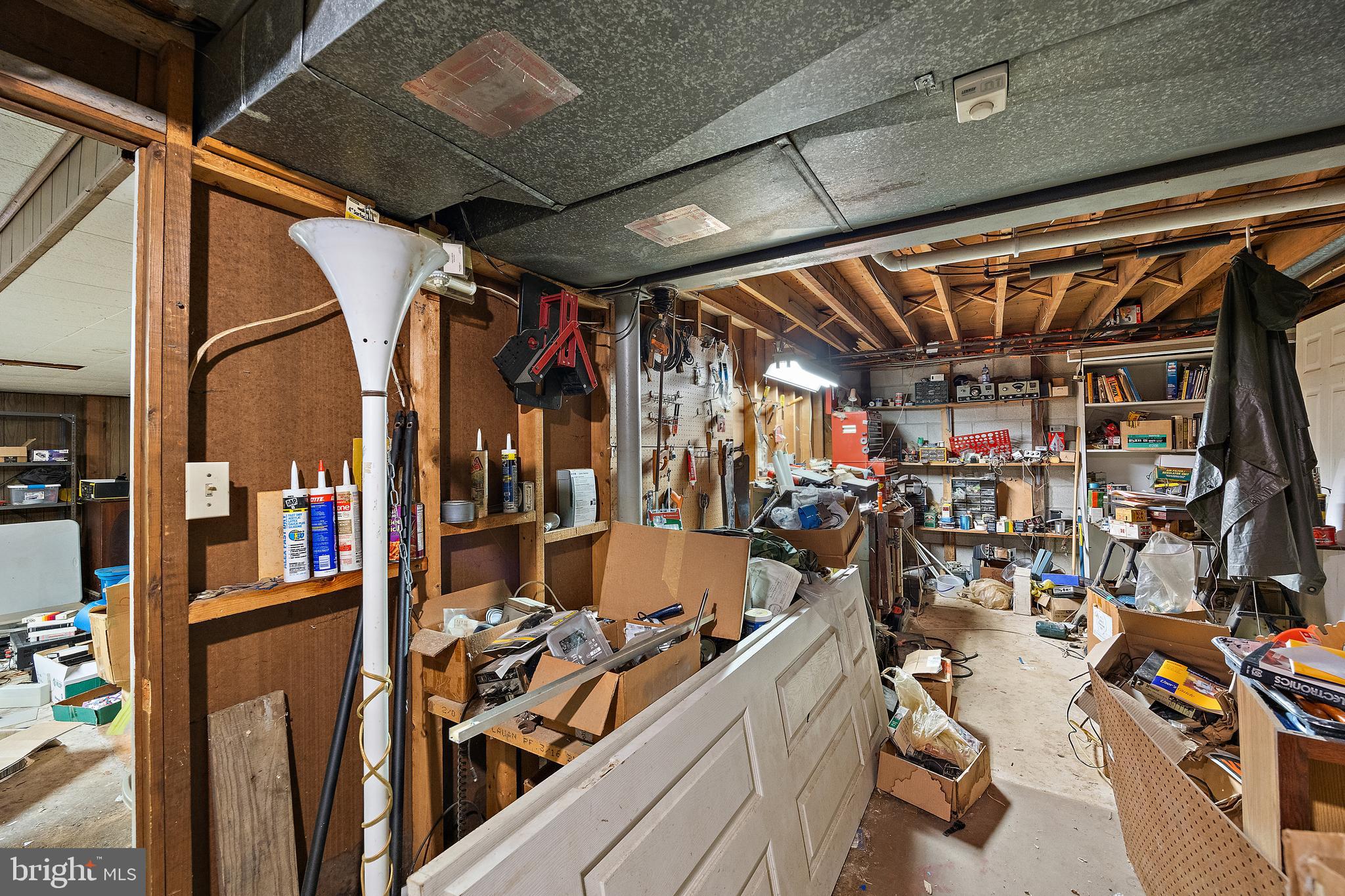 506 Cambridge Drive Newark, DE 19711 - Photo 27 of 38 a view of a storage room with a lot of stuff