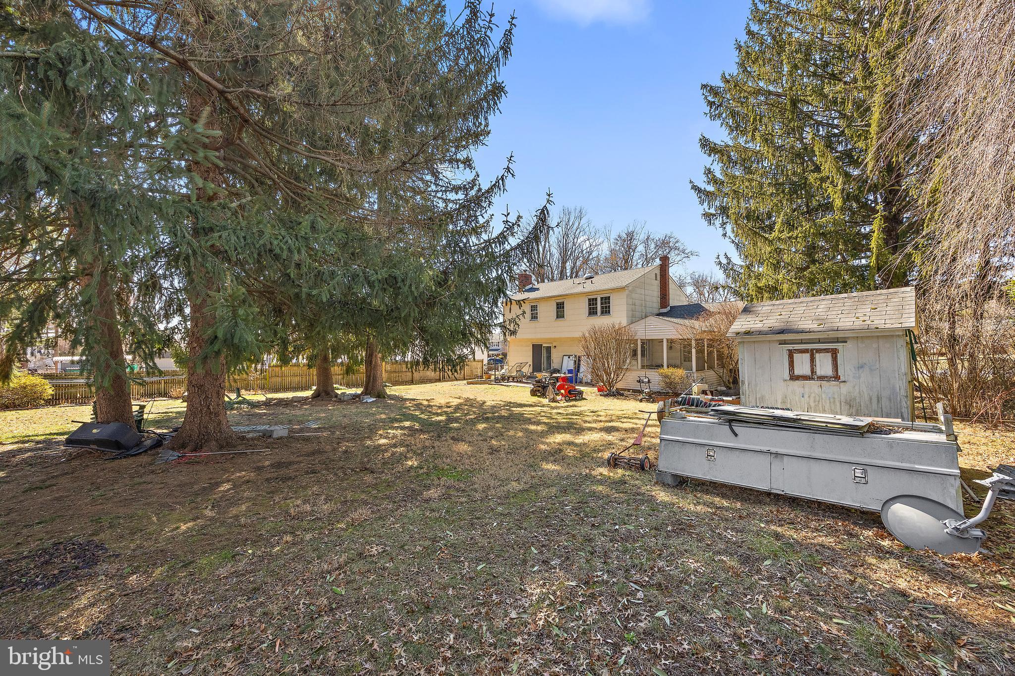 506 Cambridge Drive Newark, DE 19711 - Photo 34 of 38 a view of a house with a bed and chairs