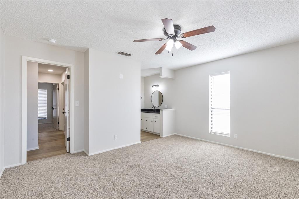 902 Turner Lane Tuscola, TX 79562 - Photo 14 of 22 a view of a livingroom with a ceiling fan and window