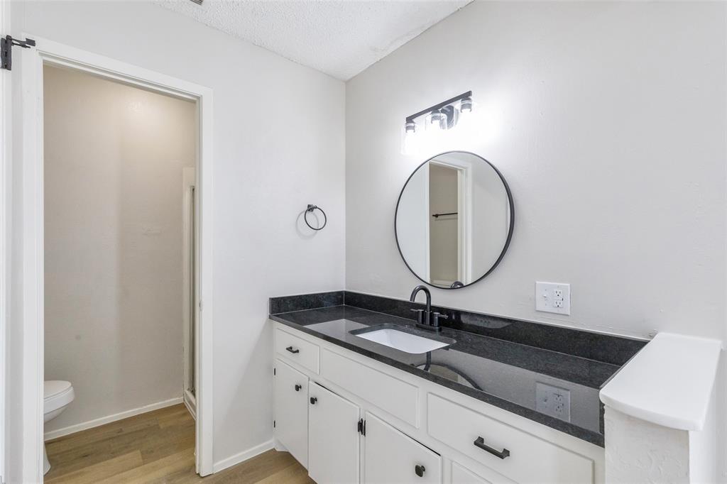 902 Turner Lane Tuscola, TX 79562 - Photo 10 of 22 a bathroom with a sink and a mirror