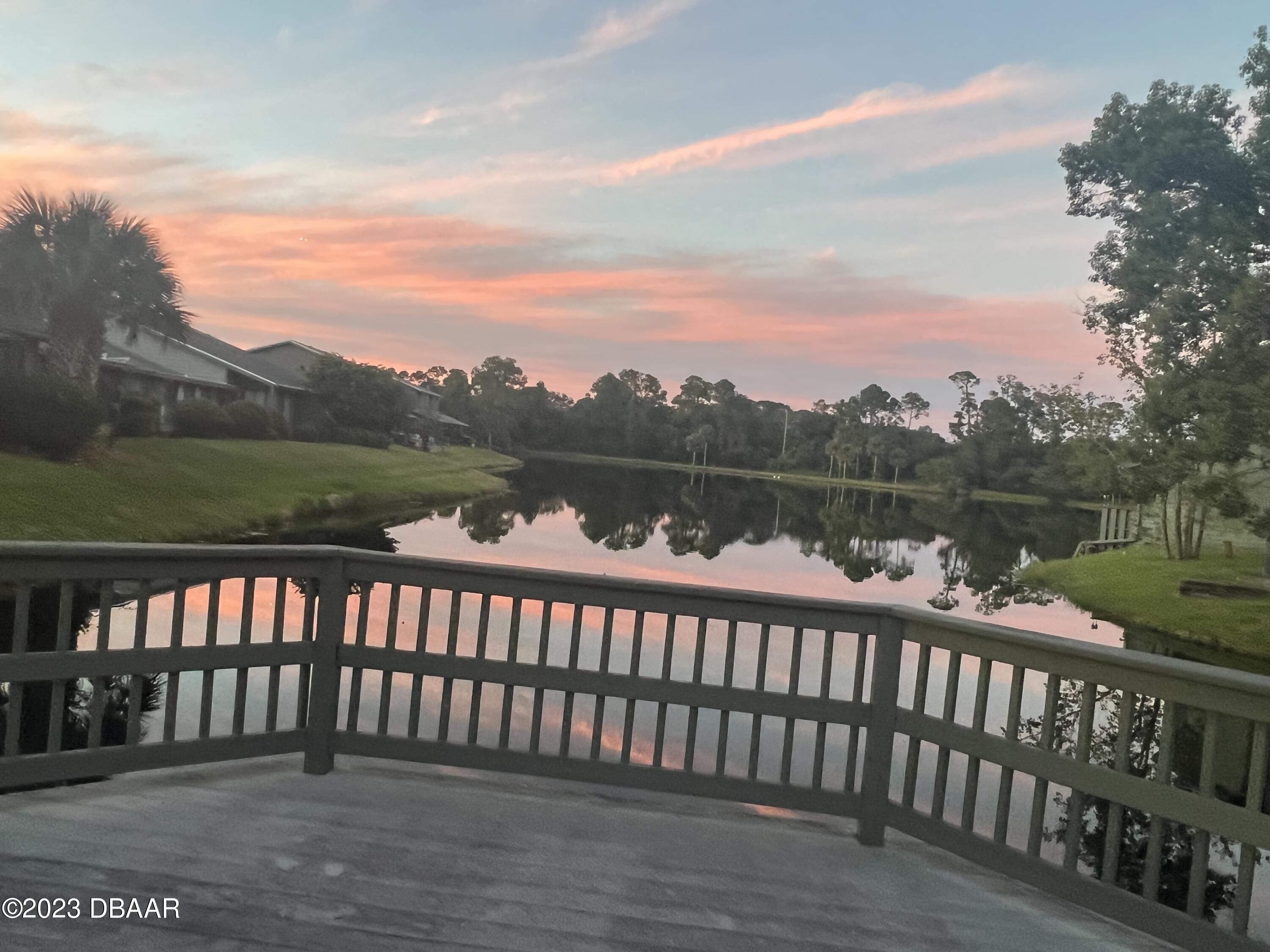 150 Limewood Place, Unit C Ormond Beach, FL 32174 - Photo 18 of 24 sunset_pond