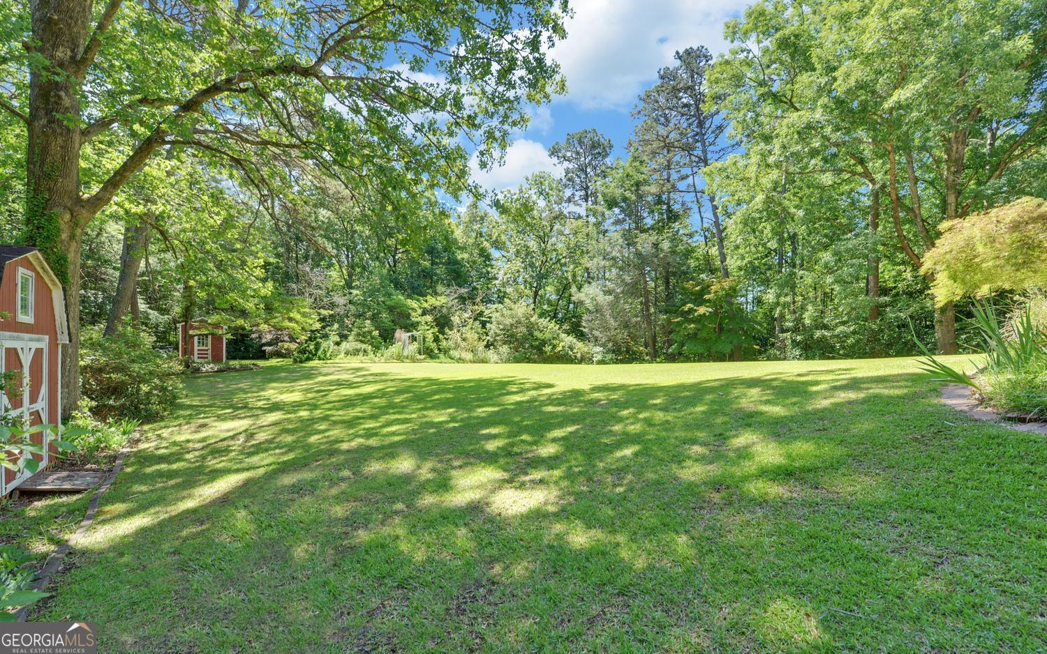 400 Harris Street Toccoa, GA 30577 - Photo 47 of 49 a view of outdoor space with deck and green space