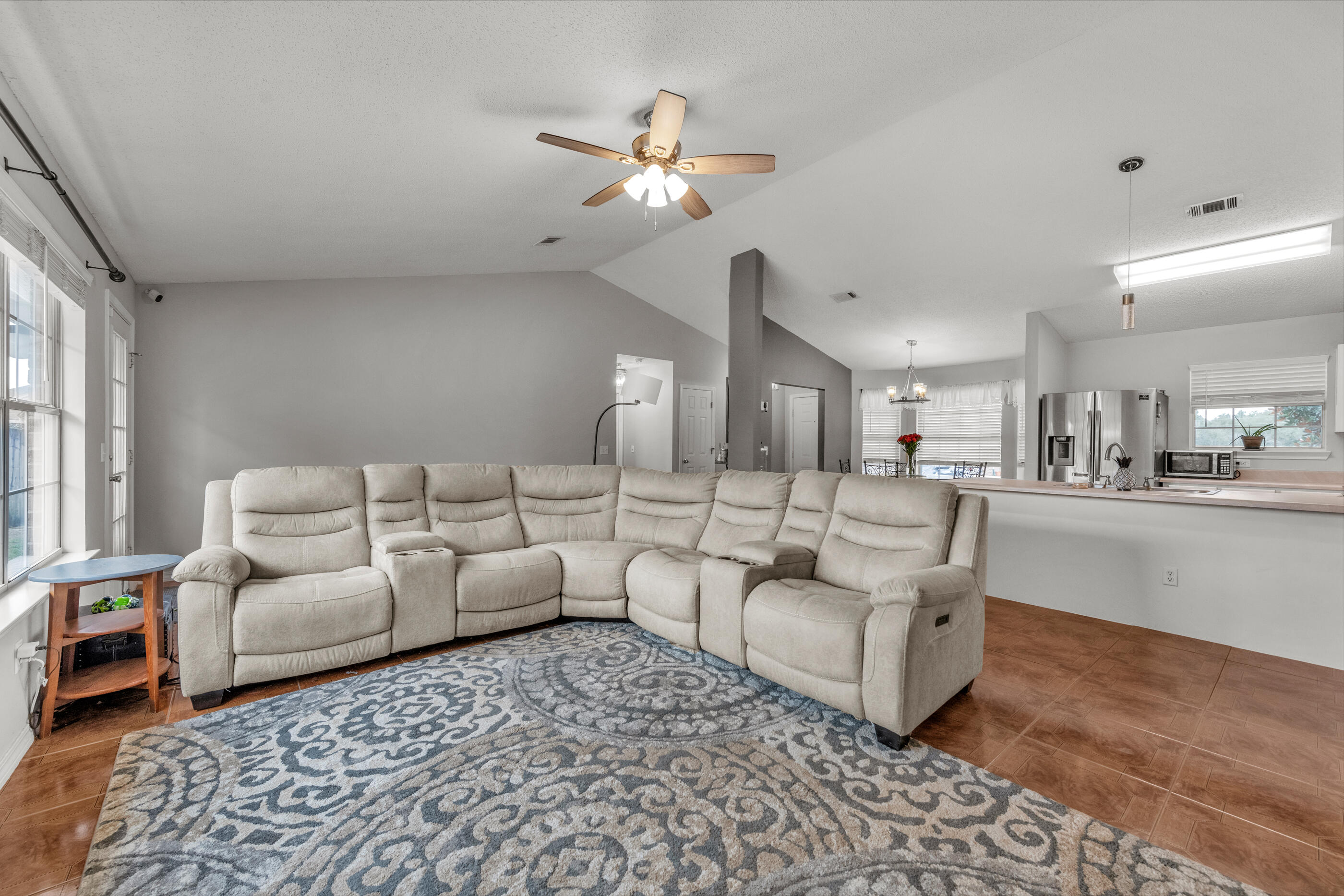 2831 Atoka Trail Crestview, FL 32539 - Photo 11 of 27 a living room with furniture and a large window