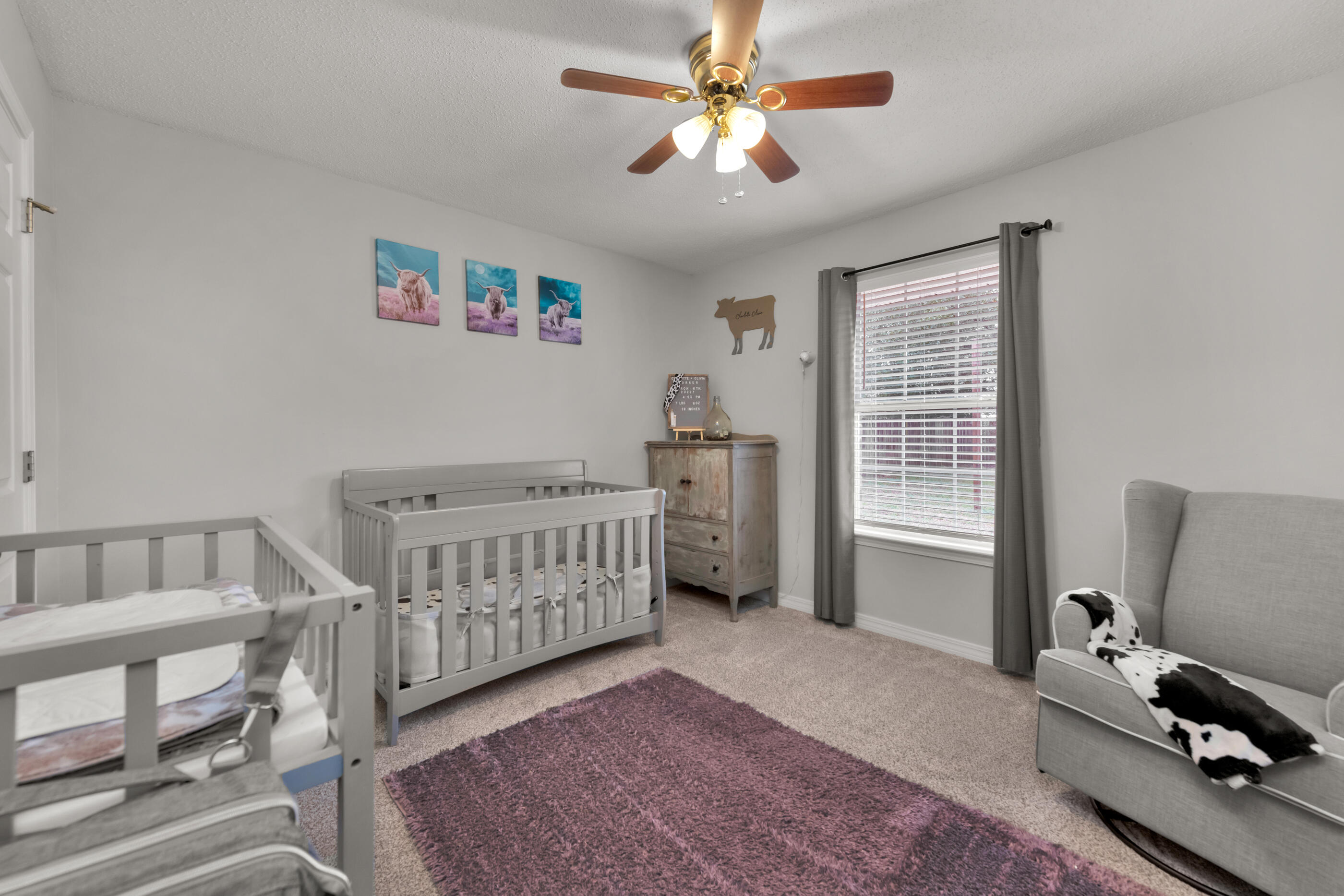 2831 Atoka Trail Crestview, FL 32539 - Photo 18 of 27 a bedroom with furniture and a window