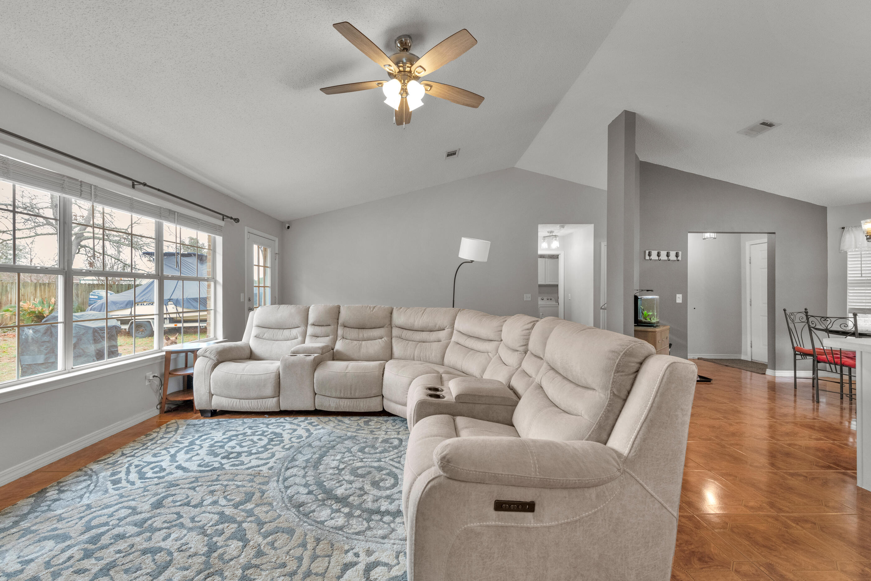 2831 Atoka Trail Crestview, FL 32539 - Photo 10 of 27 a living room with furniture and a large window