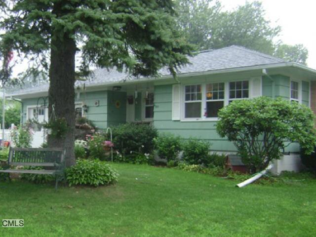 29 Canfield Road Seymour, CT 06483 - Photo 1 of 1 a front view of a house with garden