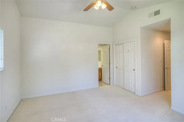 an empty room with a bathroom
