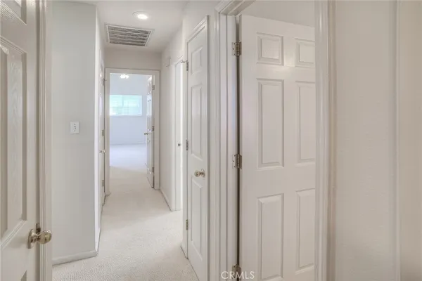a view of a bathroom with a glass door shower