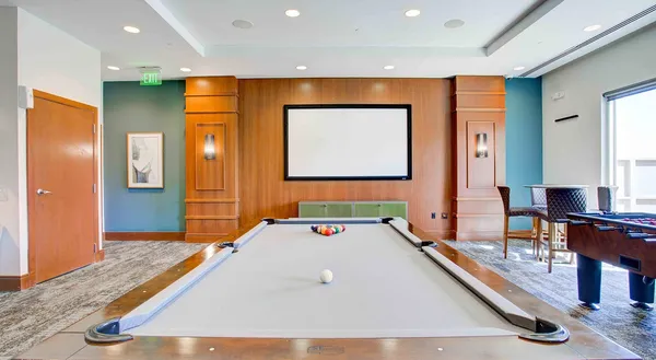 a bathroom with a sink and a large mirror