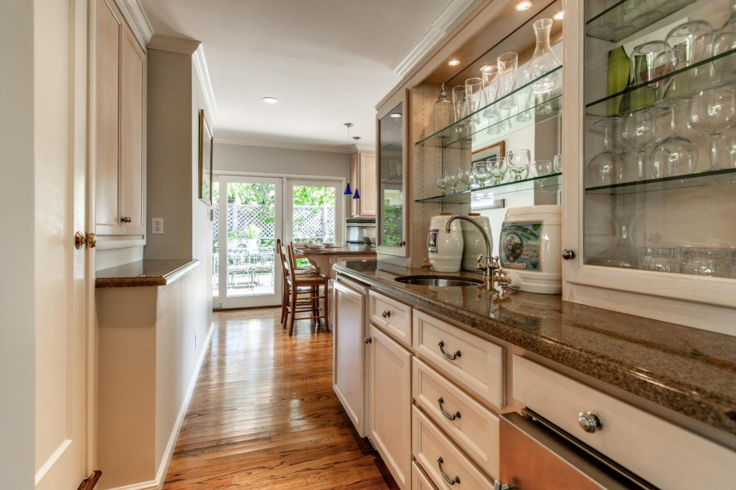 835 Longview Road Hillsborough, CA 94010 - Photo 12 of 31 a kitchen with counter top space and wooden floor