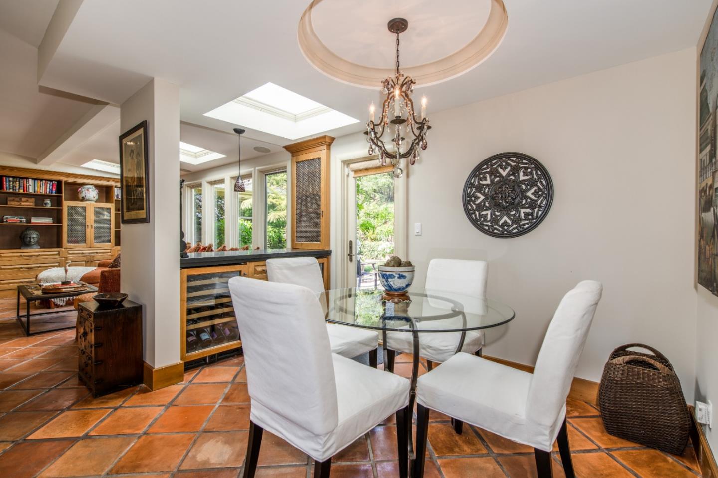 835 Longview Road Hillsborough, CA 94010 - Photo 13 of 31 a view of a dining room with furniture wooden floor and chandelier