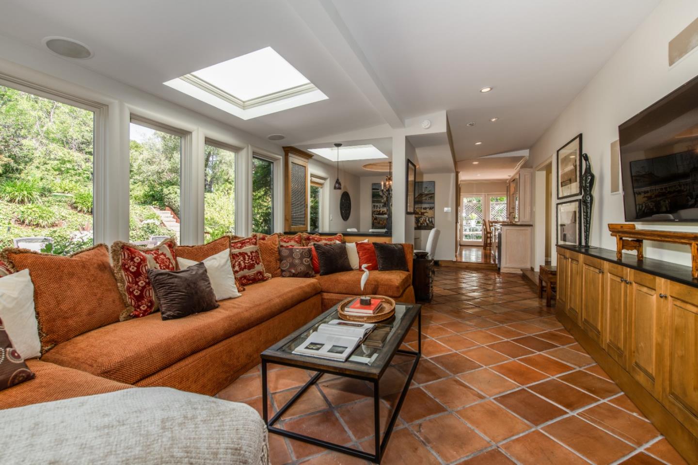 835 Longview Road Hillsborough, CA 94010 - Photo 15 of 31 a living room with furniture and a flat screen tv
