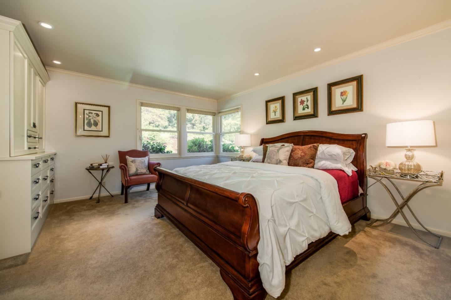 835 Longview Road Hillsborough, CA 94010 - Photo 16 of 31 a bedroom with a bed and a table