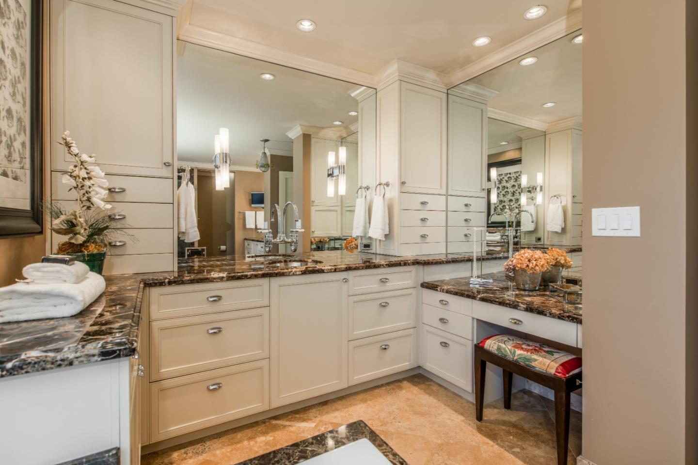 835 Longview Road Hillsborough, CA 94010 - Photo 19 of 31 a bathroom with a sink a toilet and a mirror
