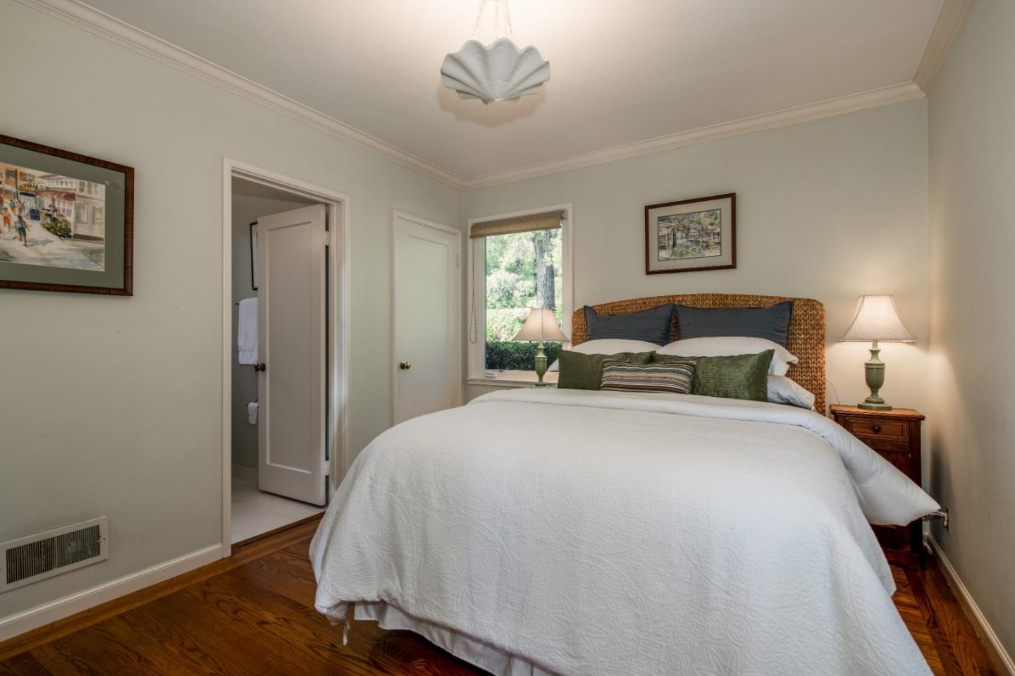 835 Longview Road Hillsborough, CA 94010 - Photo 23 of 31 a bedroom with a bed and a window