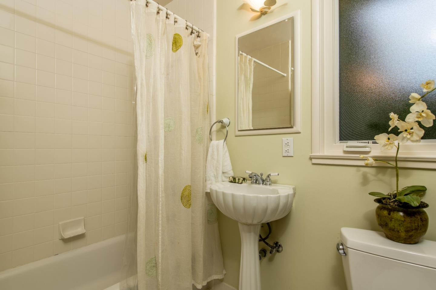 835 Longview Road Hillsborough, CA 94010 - Photo 24 of 31 a bathroom with a sink toilet and shower