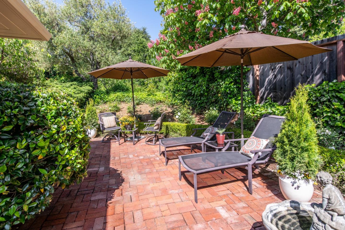 835 Longview Road Hillsborough, CA 94010 - Photo 26 of 31 a backyard view with a seating space