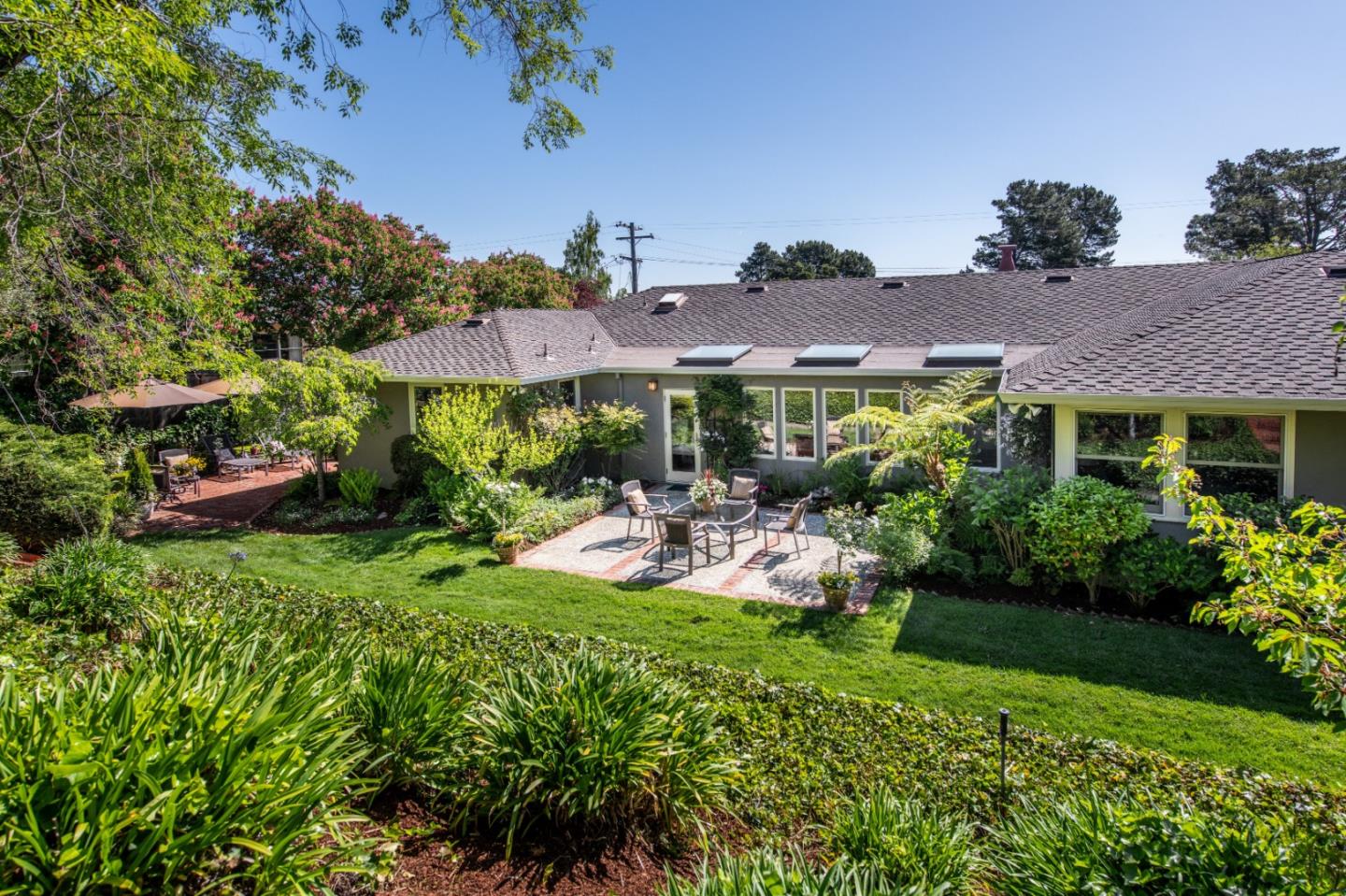 835 Longview Road Hillsborough, CA 94010 - Photo 29 of 31 a view of a house with a yard and sitting area
