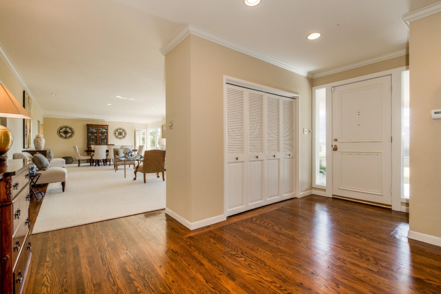 835 Longview Road Hillsborough, CA 94010 - Photo 4 of 31 a view of a livingroom with furniture and hardwood floor