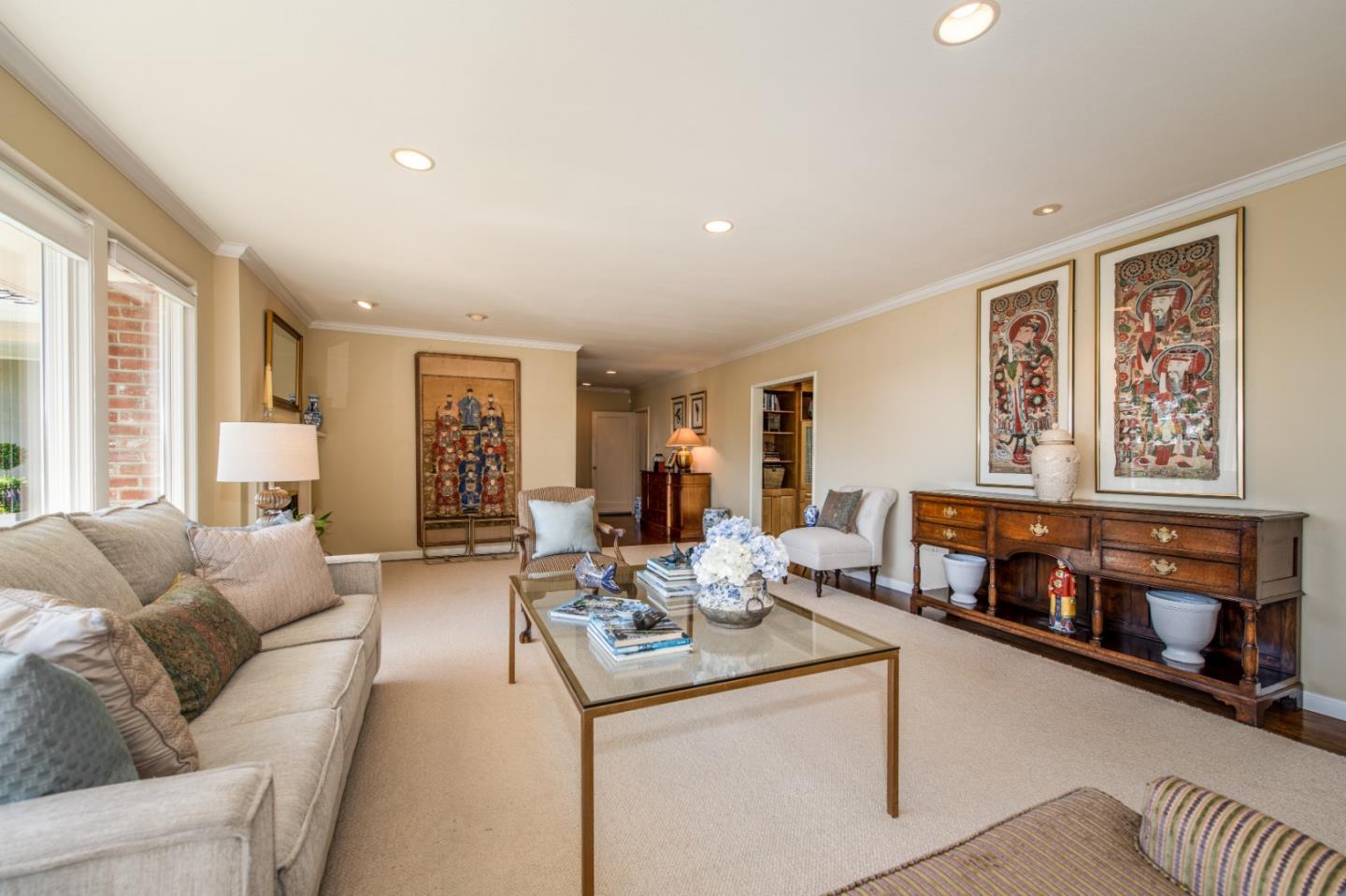 835 Longview Road Hillsborough, CA 94010 - Photo 7 of 31 a living room with furniture and a fireplace