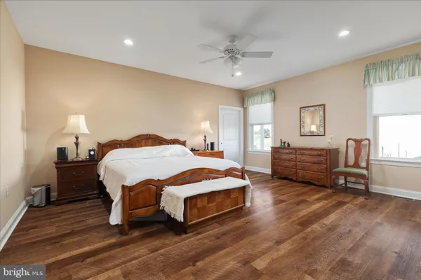 a living room with furniture rug and window
