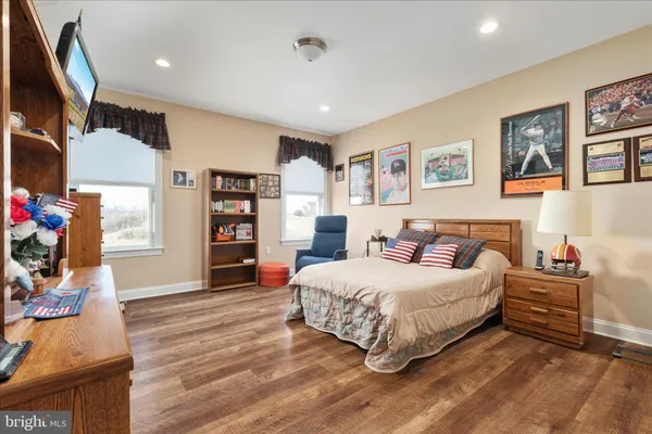 a view of a lake with houses in the back