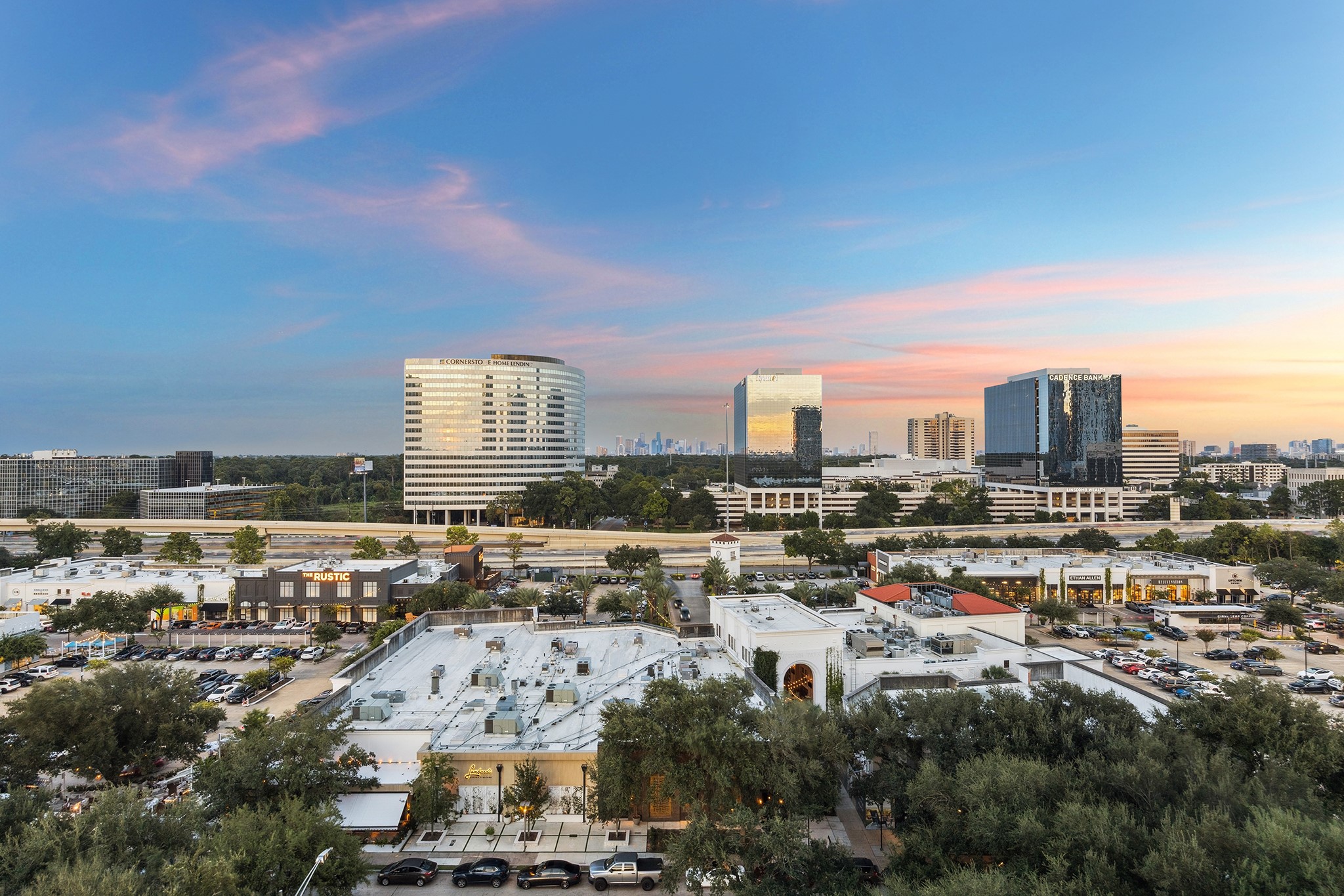 1100 Uptown Park Boulevard, Unit 102 Houston, TX 77056 - Photo 17 of 33 a view of a city with tall buildings