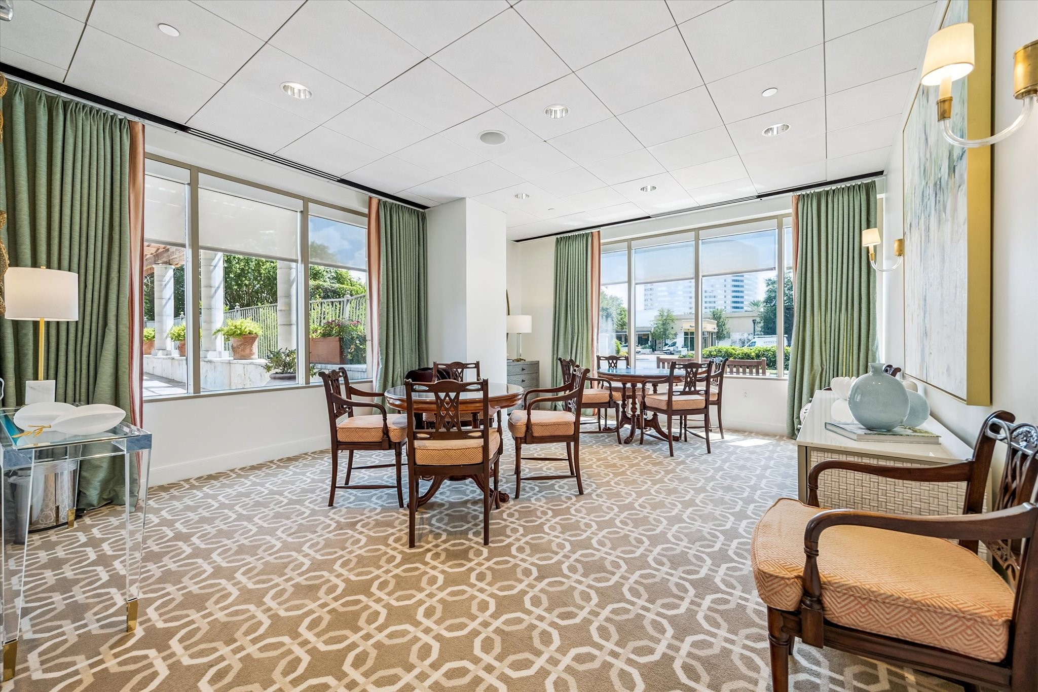 1100 Uptown Park Boulevard, Unit 102 Houston, TX 77056 - Photo 27 of 33 a living room with furniture and large windows