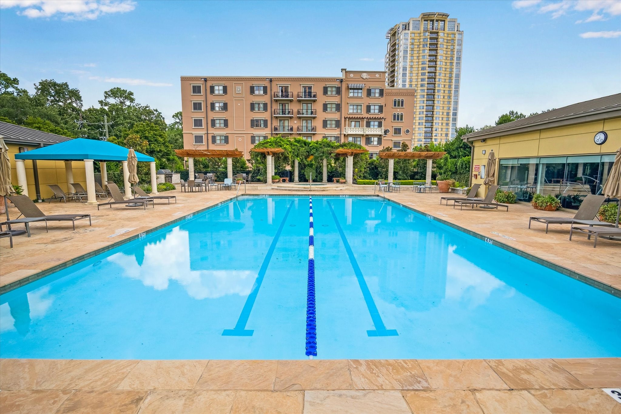 1100 Uptown Park Boulevard, Unit 102 Houston, TX 77056 - Photo 30 of 33 a view of a swimming pool with outdoor seating