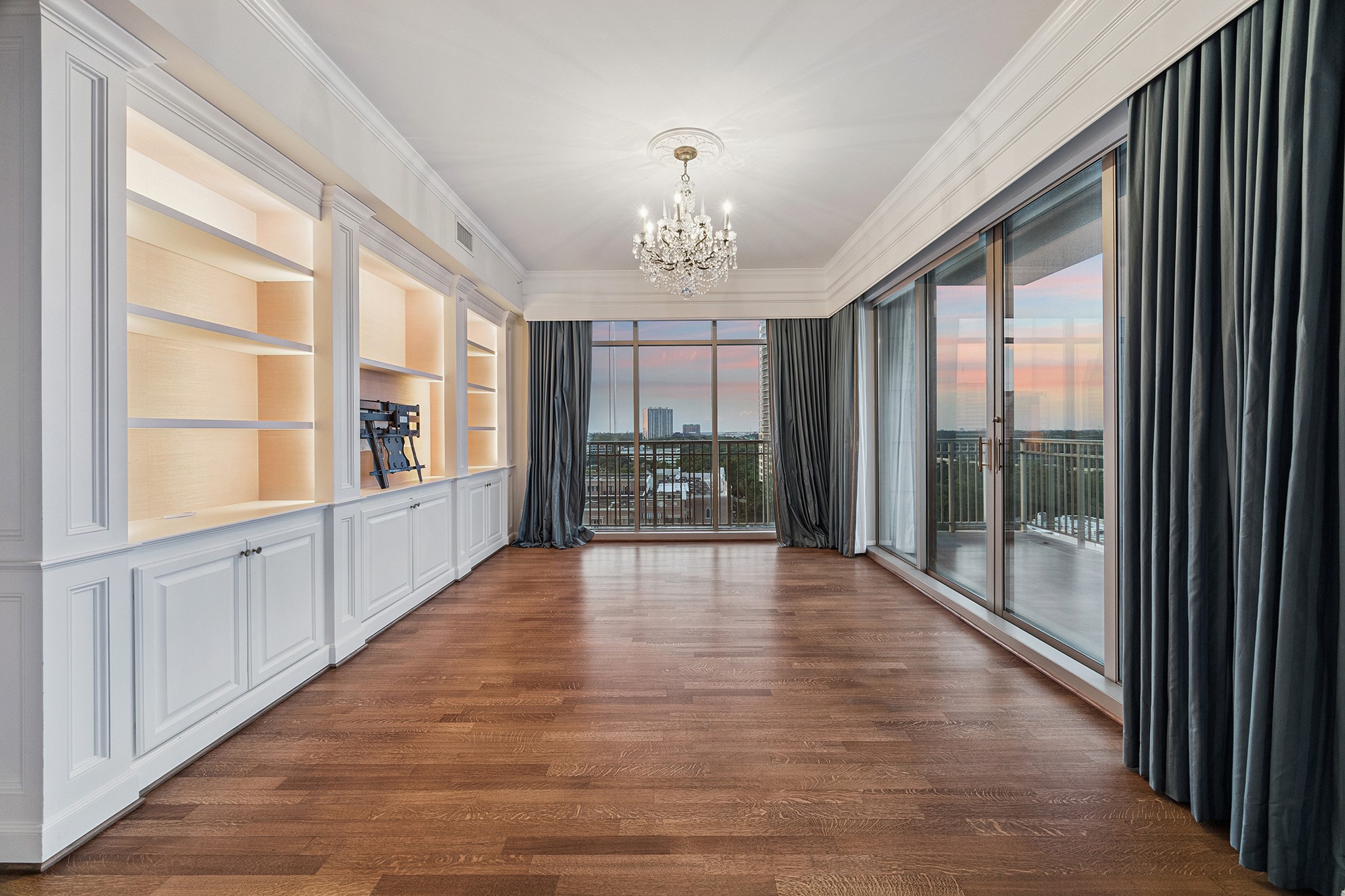 1100 Uptown Park Boulevard, Unit 102 Houston, TX 77056 - Photo 3 of 33 a view of an entryway with wooden floor and windows