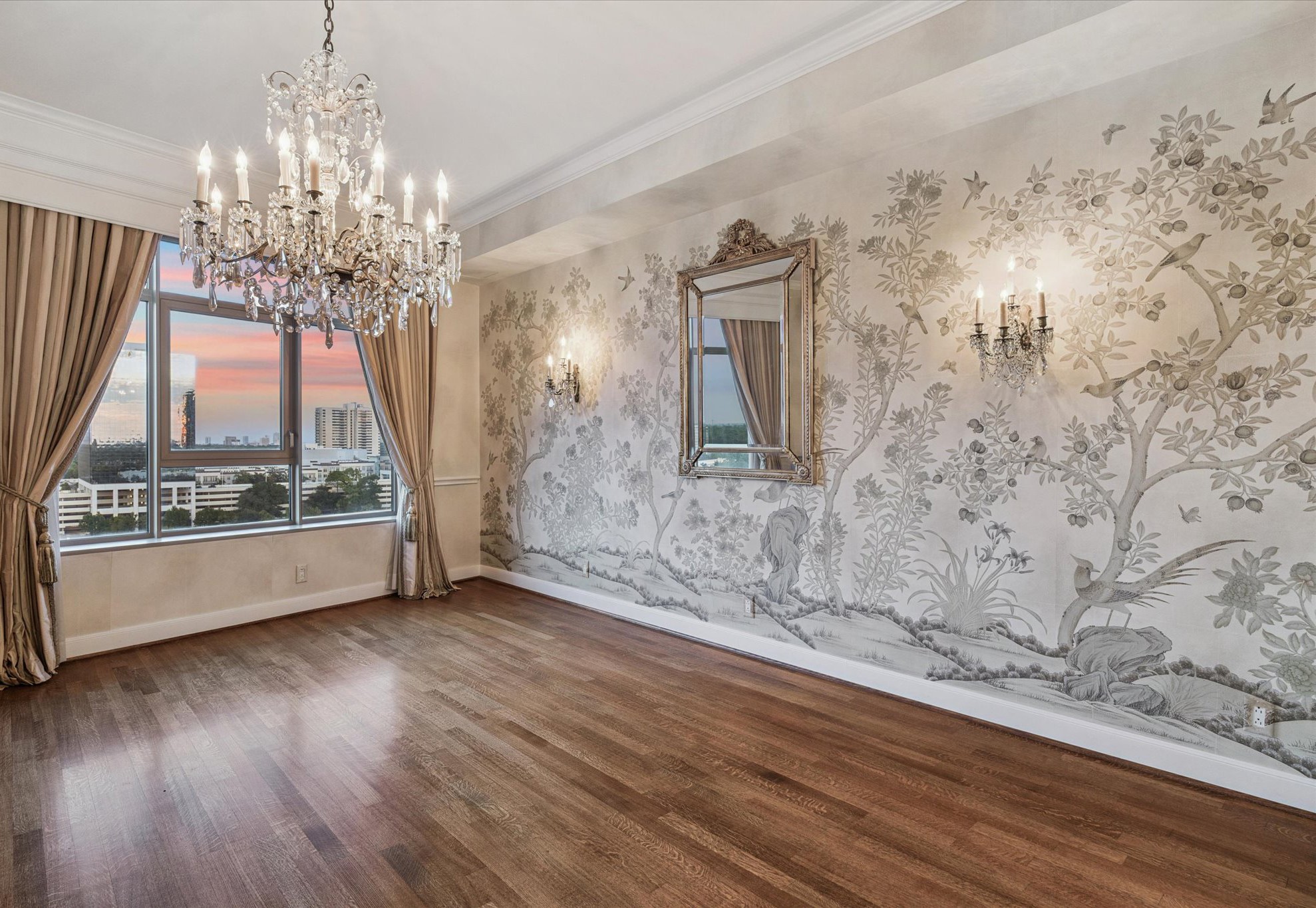1100 Uptown Park Boulevard, Unit 102 Houston, TX 77056 - Photo 5 of 33 a view of a livingroom with wooden floor and a large window