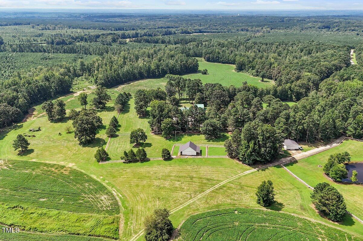 206 Shaver Road Macon, NC 27551 - Photo 63 of 68 a view of a garden with an outdoor space
