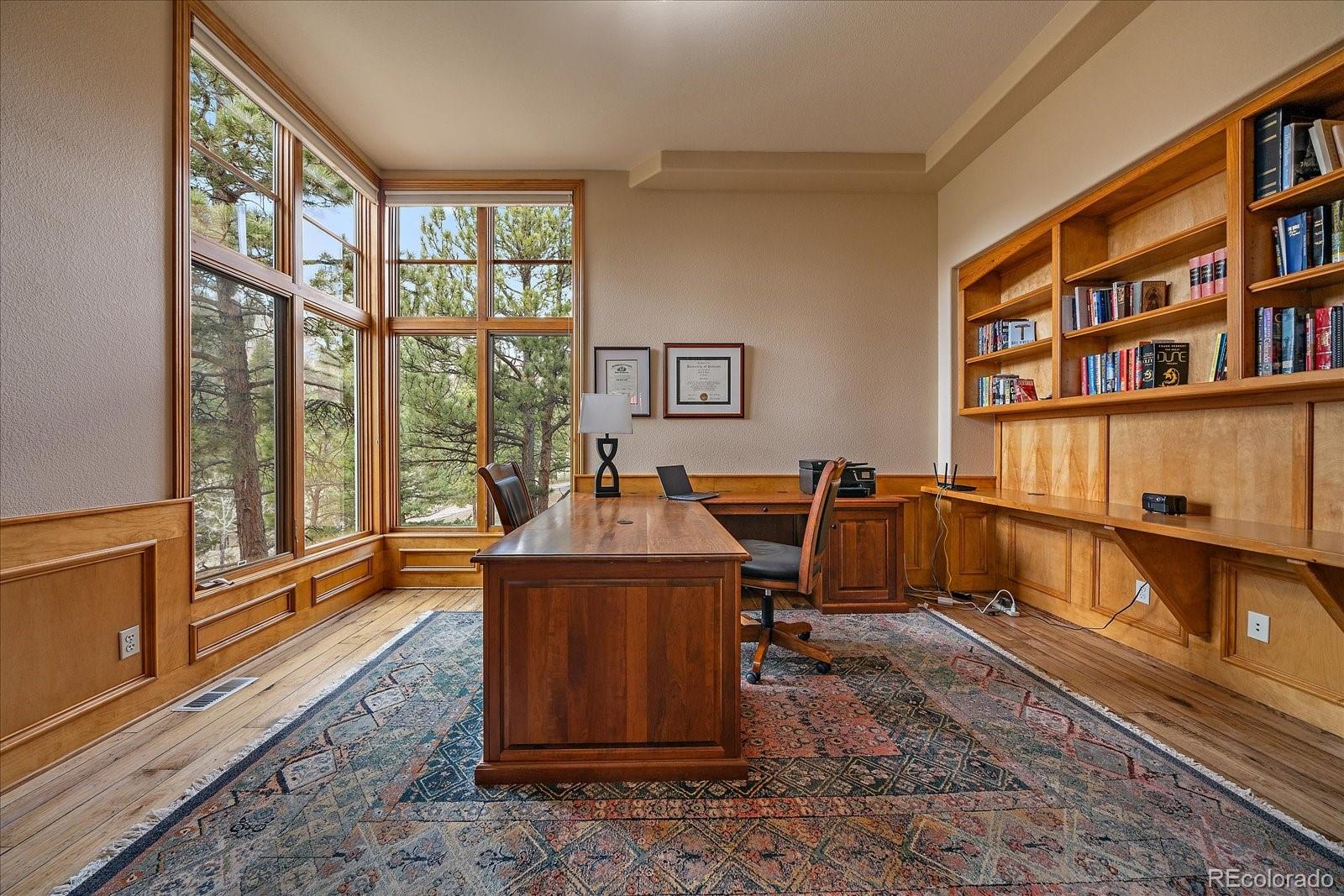 6737 Timbers Drive Evergreen, CO 80439 - Photo 20 of 47 a view of a work space with a large window