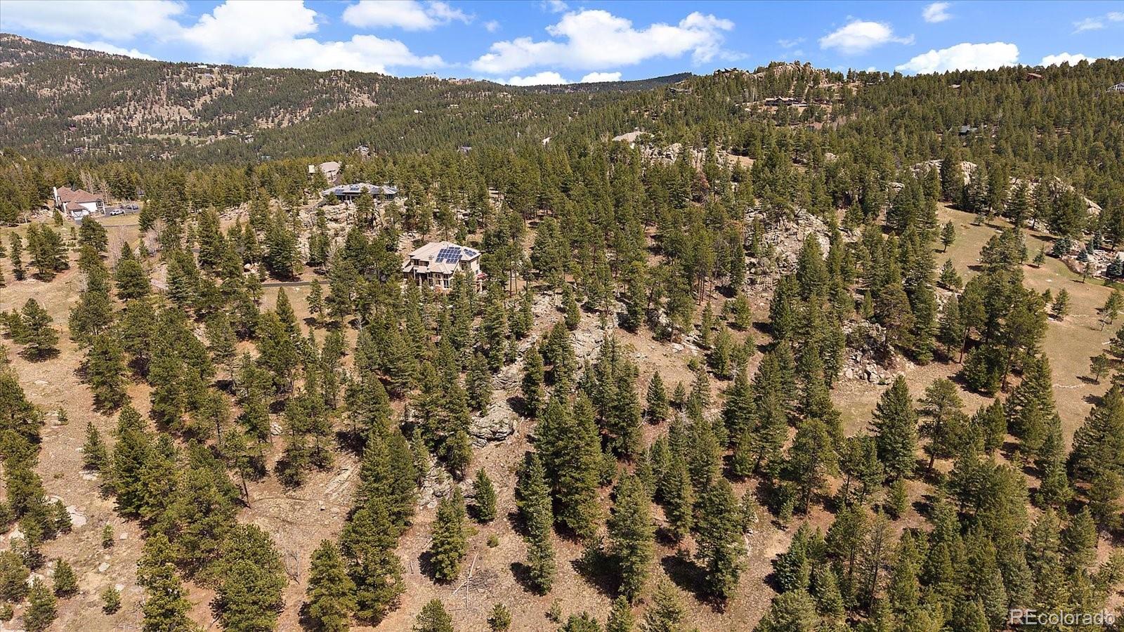 6737 Timbers Drive Evergreen, CO 80439 - Photo 44 of 47 a view of city and mountain